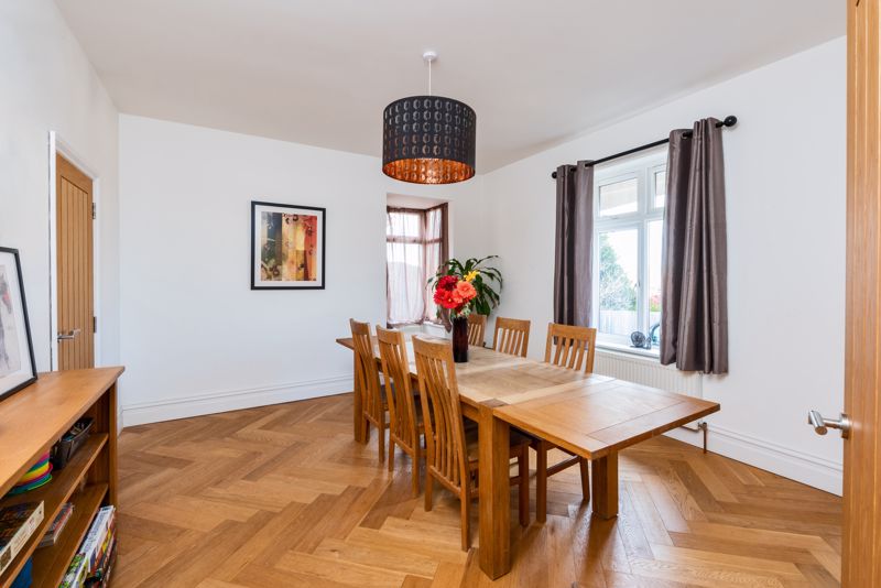Dining Room With Oak Flooring